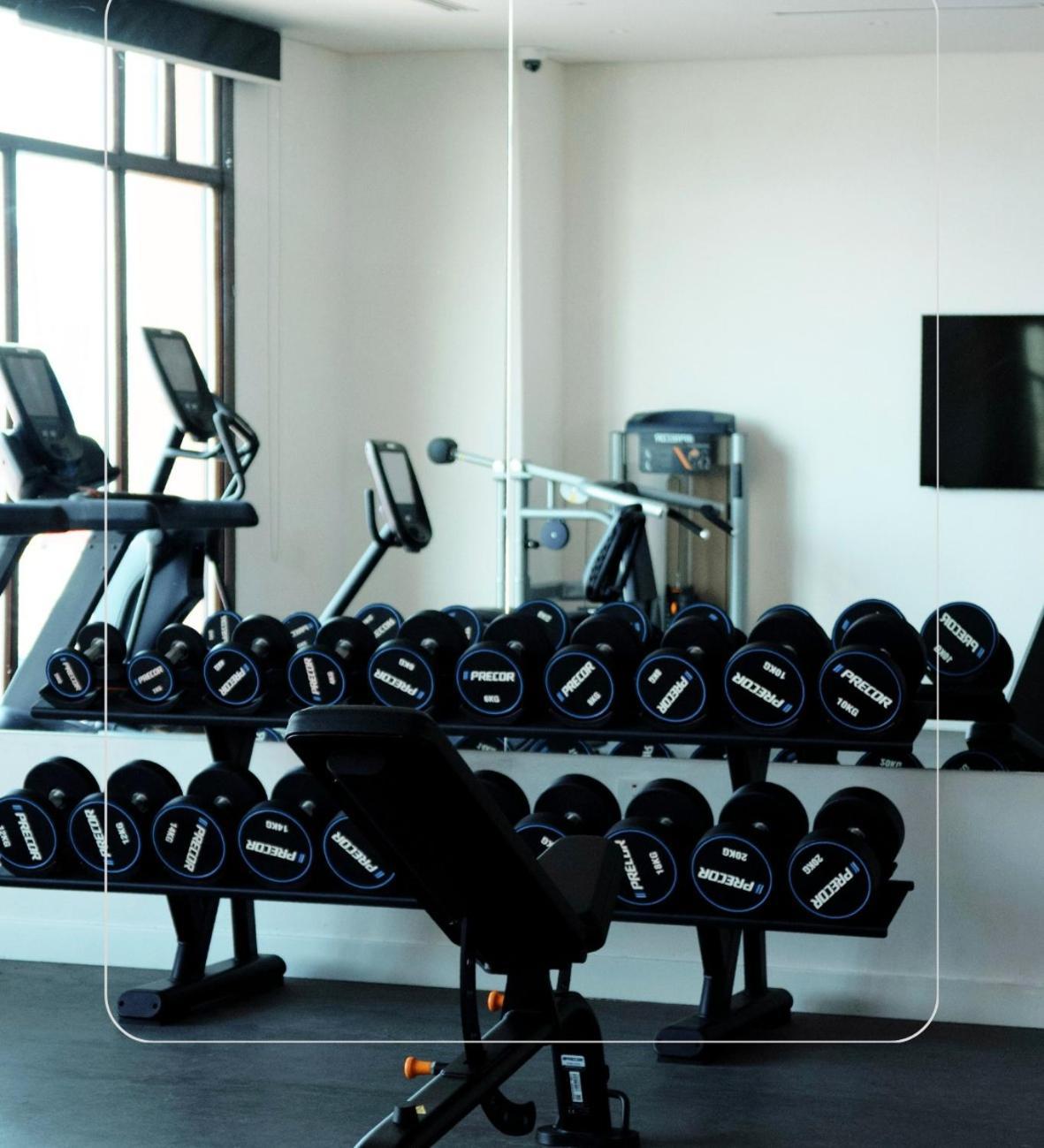 Mina Hotel And Residences By The Torch Доха Экстерьер фото A set of dumbbells