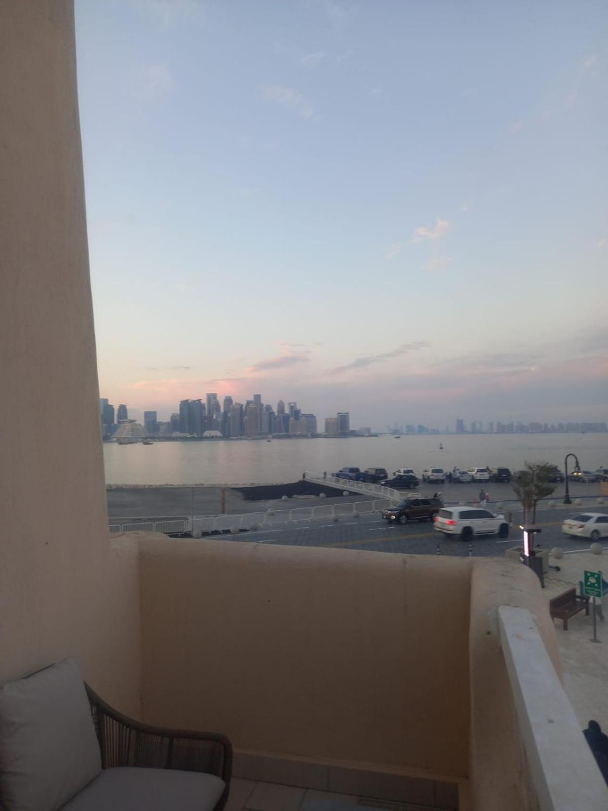 Mina Hotel And Residences By The Torch Доха Экстерьер фото View of Manama skyline from a residential area in Saar