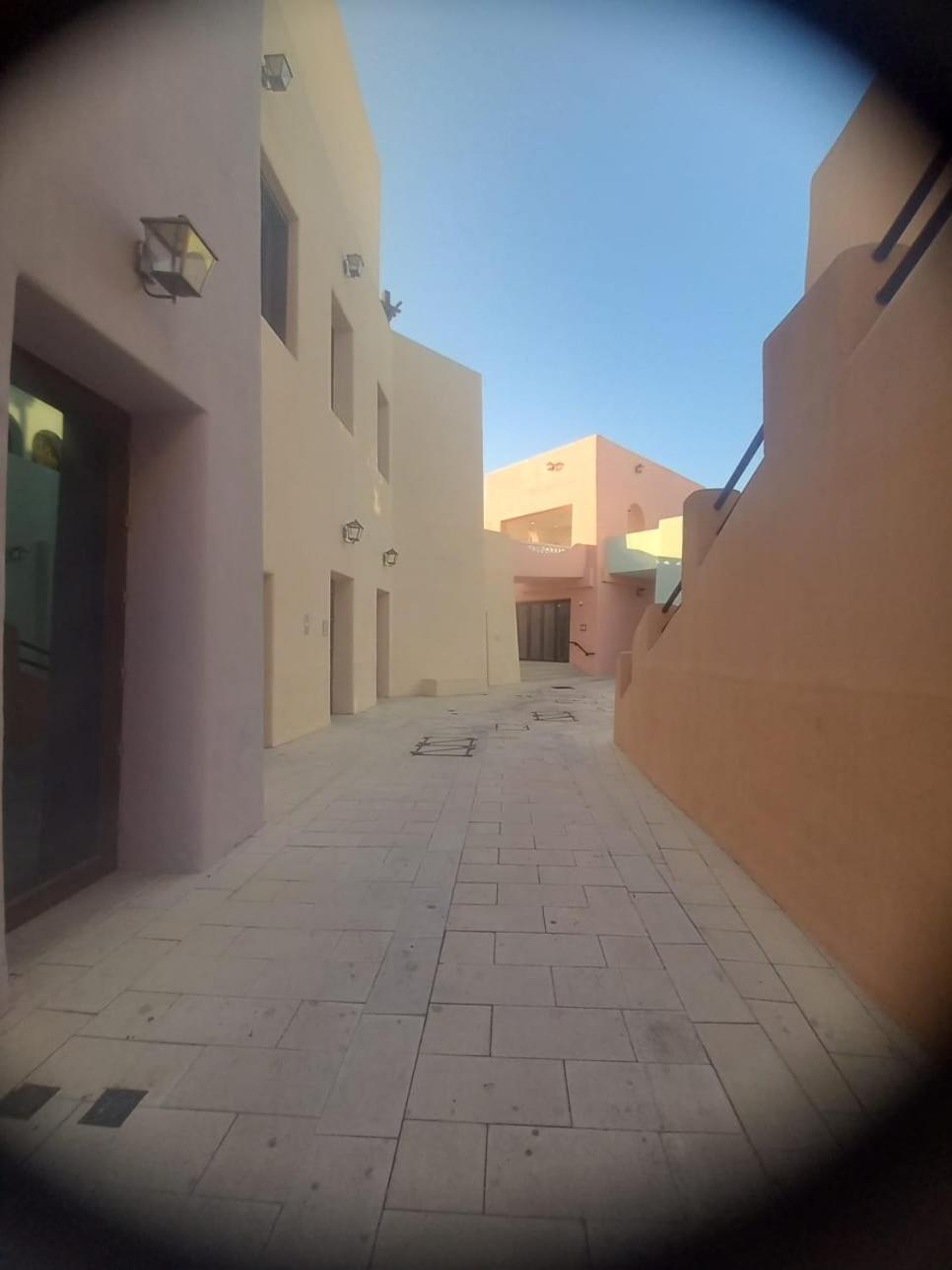 Mina Hotel And Residences By The Torch Доха Экстерьер фото A street in Al-Qatif